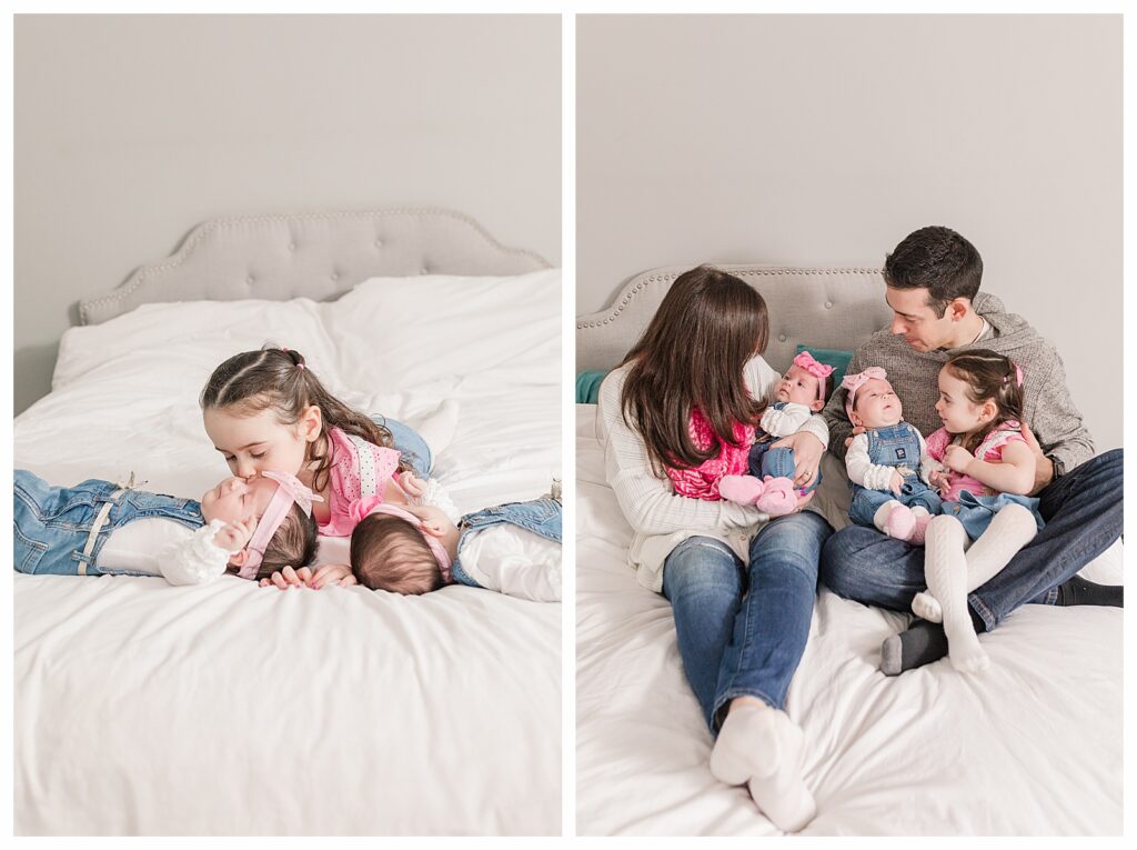 big sister kissing baby on bed. family with twins on bed. Norhthboro MA twin Newborn Photographer