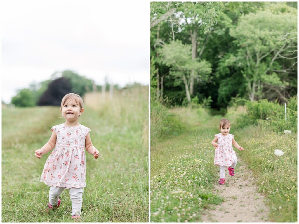 two year old walking in field for birthday photos