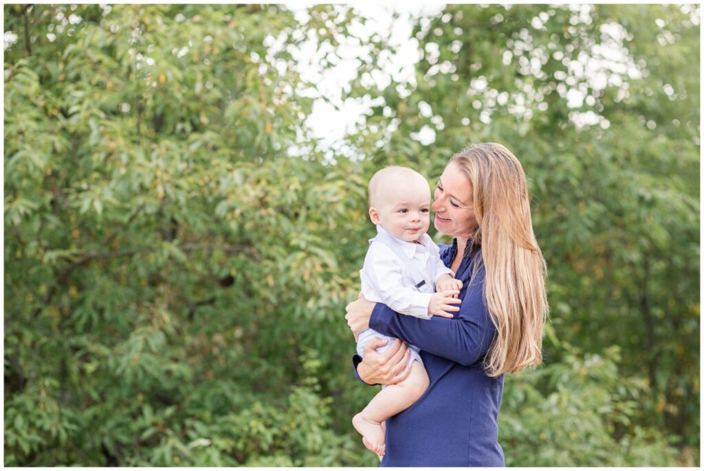 Needham Massachusetts Mom smills at son for one year old photo session