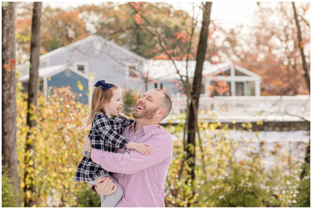  Father laughs with daughter photo MetroWest Boston Massachusetts