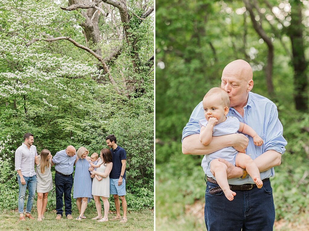 family smiles at baby and grandfather kisses babies head during extended family photo session at Elm Bank, Wellesley Massachusetts with Sara Sniderman Photography