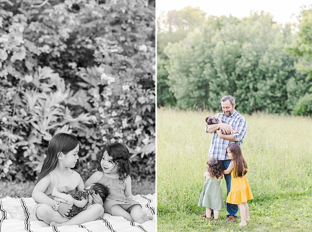 black and white photo of sisters holding baby and dad holding baby while older sisters hug his legs during outdoor newborn photo session with Sara Sniderman Photography at Heard Farm, Wayland Massachusetts