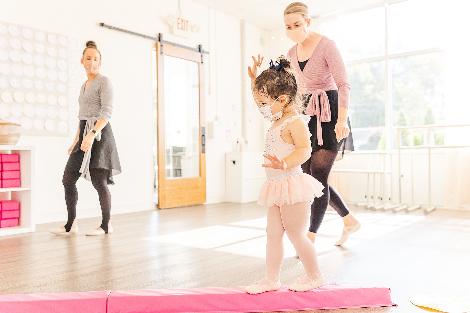 girl walks on balance beam during DanceFIT tippy toes class in Natick Massachusetts