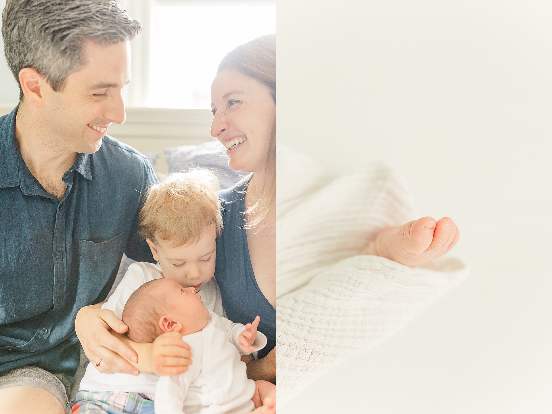 baby foot and family smiles together during in home newborn photo session with Sara Sniderman Photography in Ashland Massachusetts