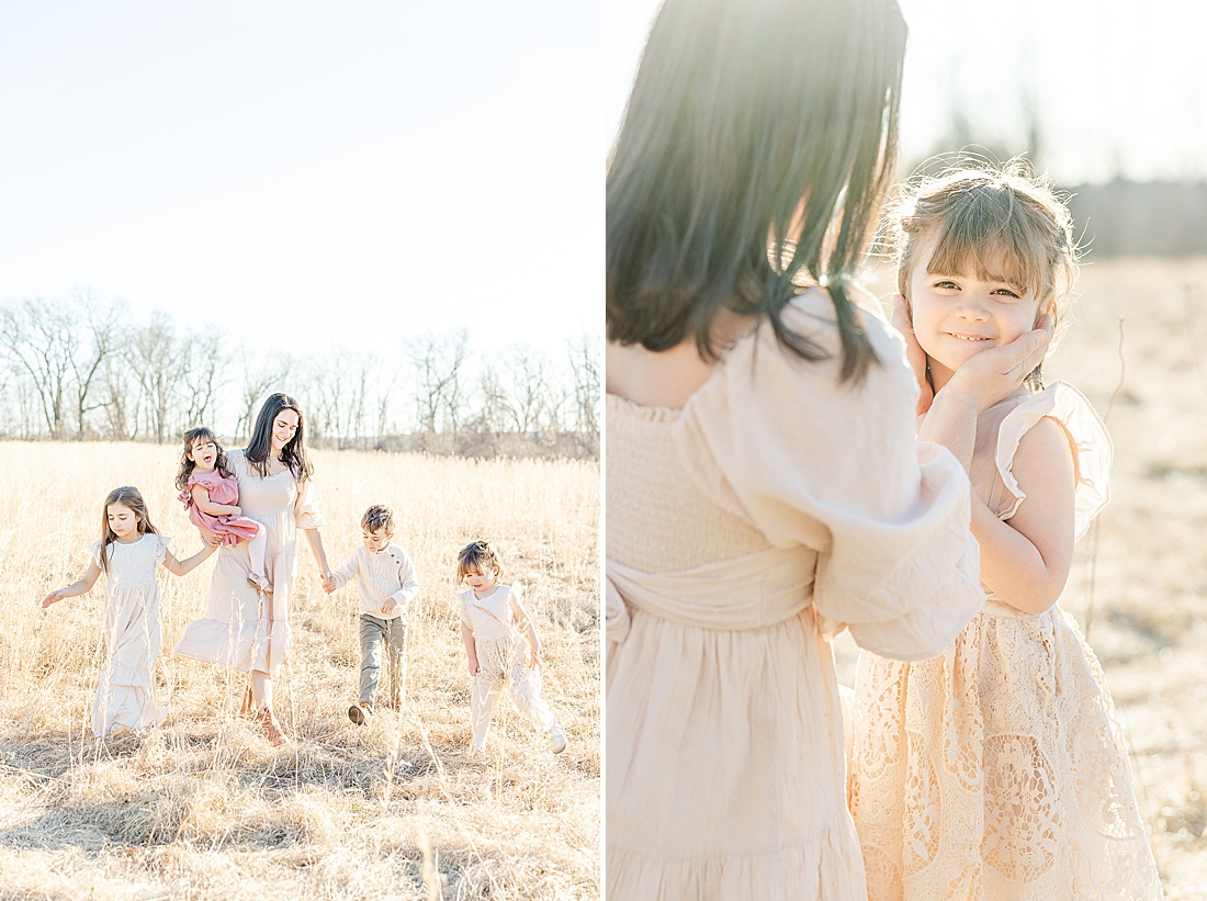 mom with kids during winter photo session in tall golden grass at medfield state hospital with Sara Sniderman Photography