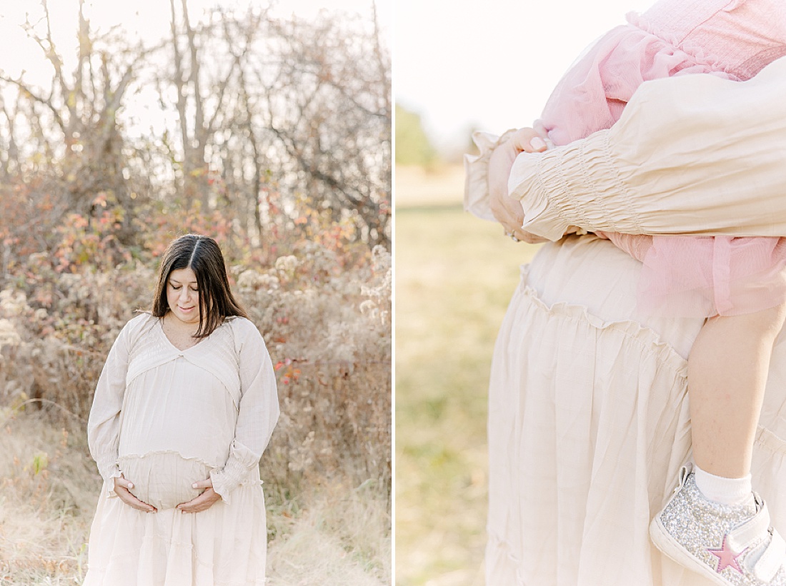 mother holds daughter during maternity photo session with Sara Sniderman Photography in Needham Massachusetts