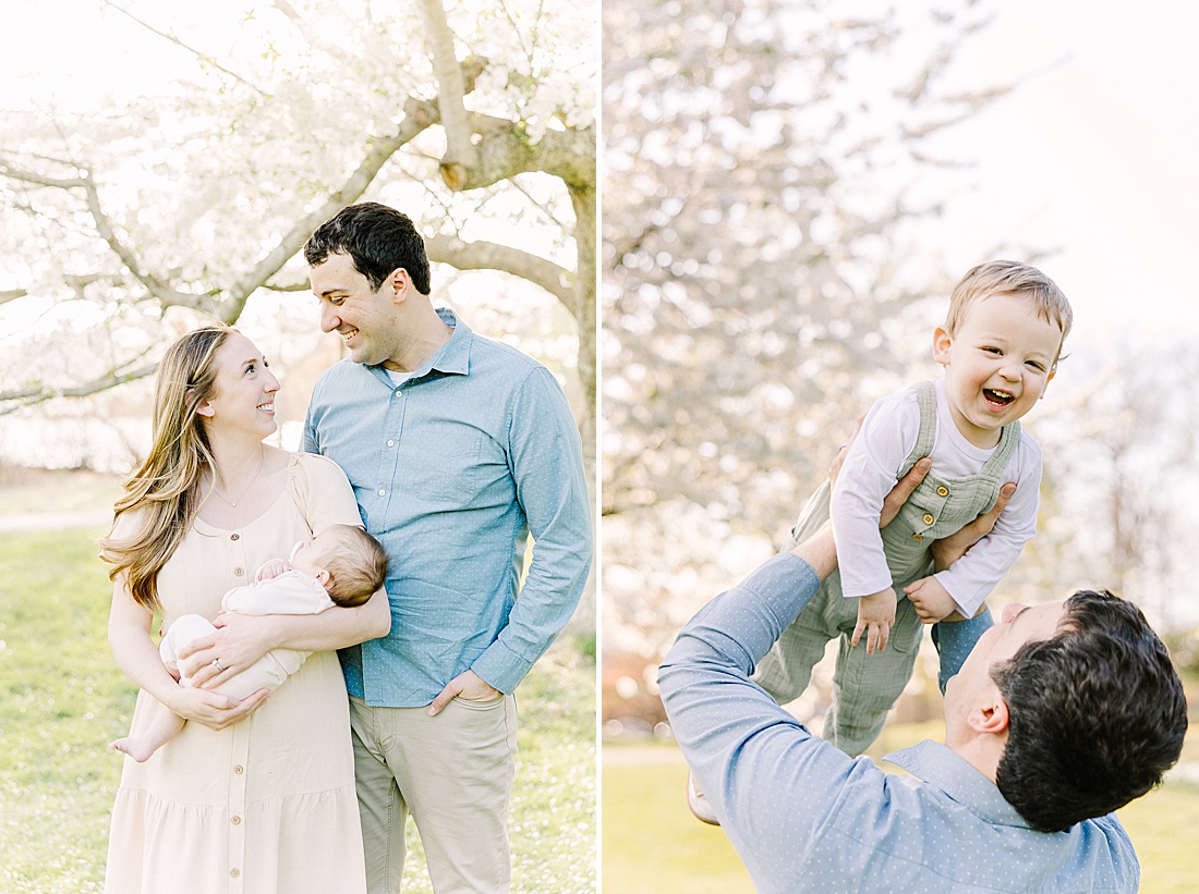 dad holds son up high uring family photo session with Sara Sniderman Photography at Wellesley College.