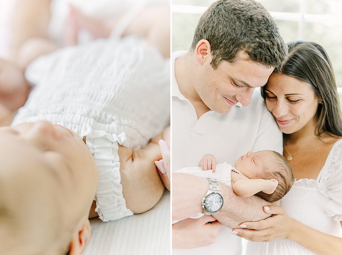 parents hold baby during in-home newborn photo session with Sara Sniderman Photography in Natick Massachusetts
