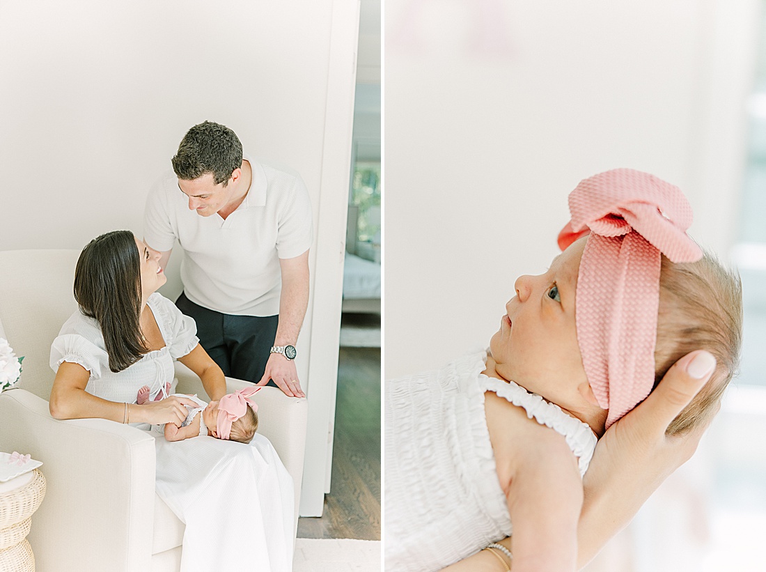 mother sits in rocking chair with baby as dad looks at them during in-home newborn photo session with Sara Sniderman Photography in Natick Massachusetts