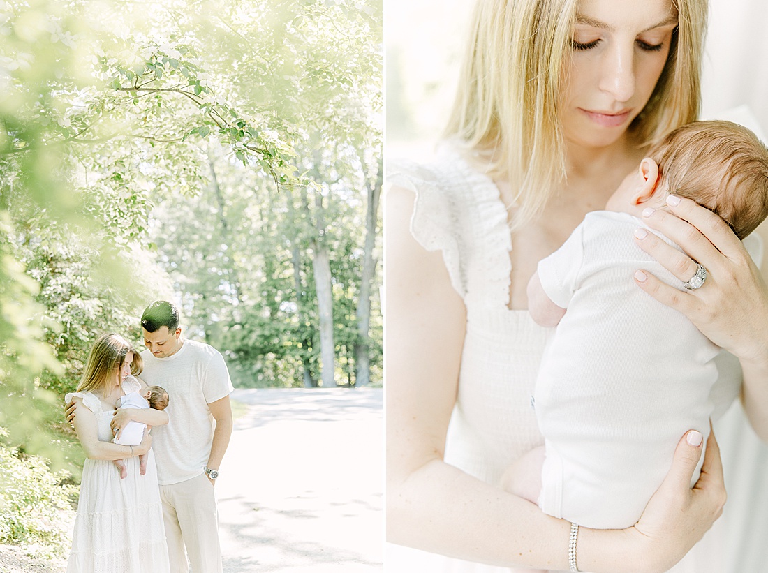family stands under blooming tree during during in-home newborn photo session welcoming baby home with Sara Sniderman Photography in Natick Massachusetts