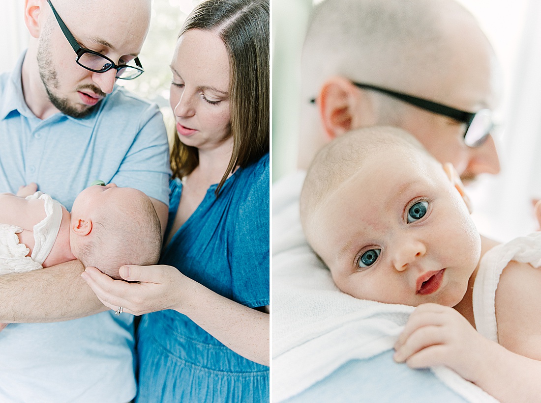 father holds baby during in home newborn photo session with Sara Sniderman Photography in Metro West Boston. 