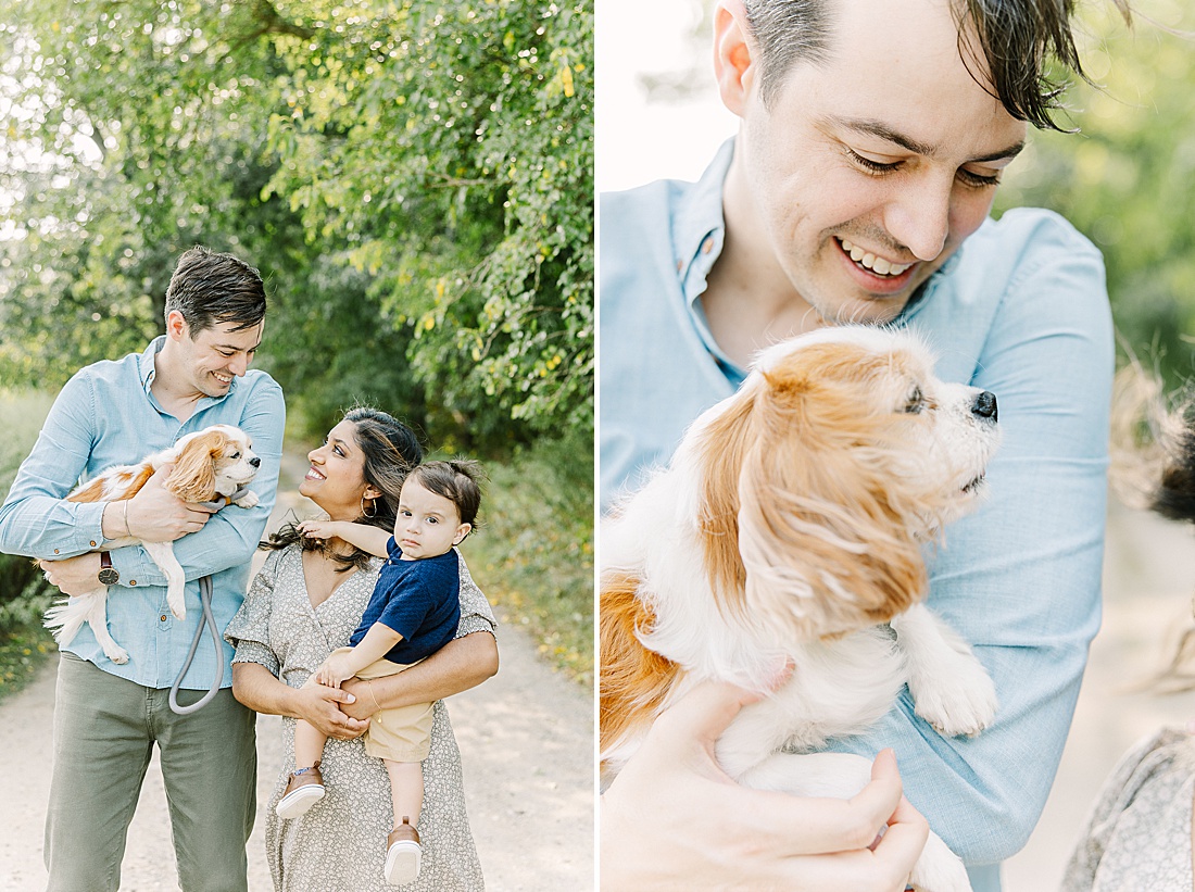 father holds dog and mother holds son during birthday photo session with Sara Sniderman Photography in Newton Masachusettd