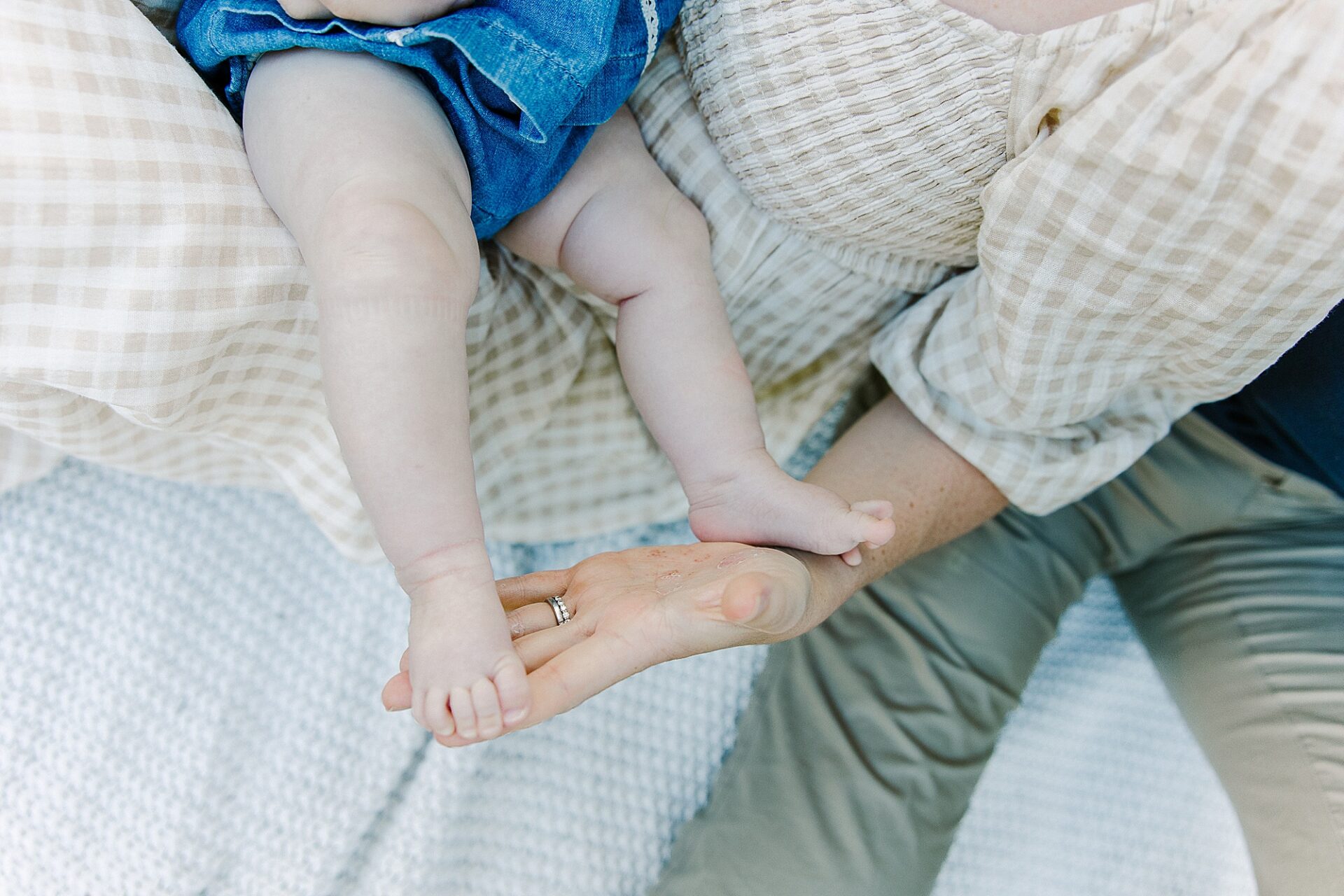 faceless baby photos during outdoor newborn photo session with Sara Sniderman Photography at Wellesley College