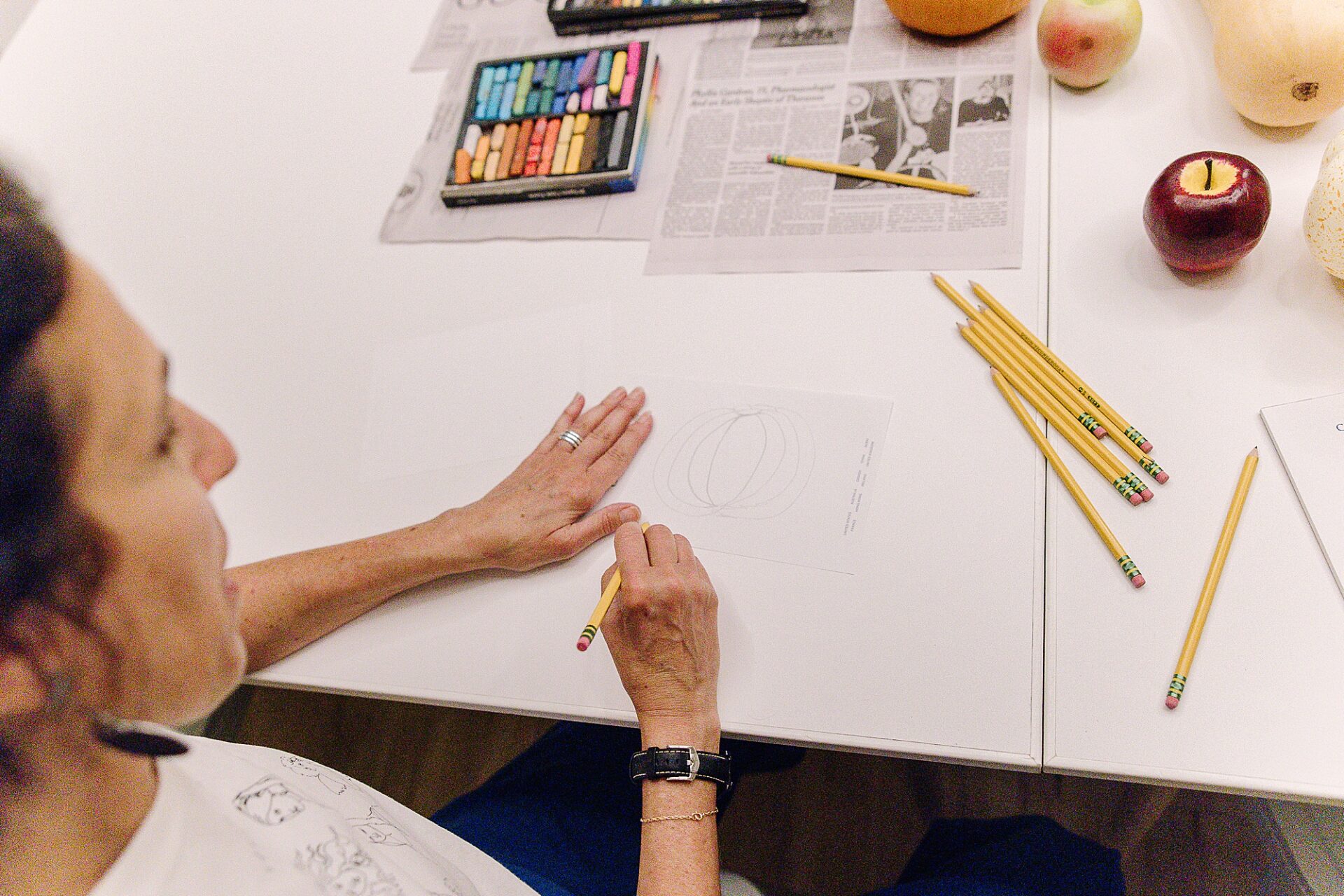 woman hands writing with a pencil during art class at Bloom and Grown in Natick Massachusetts
