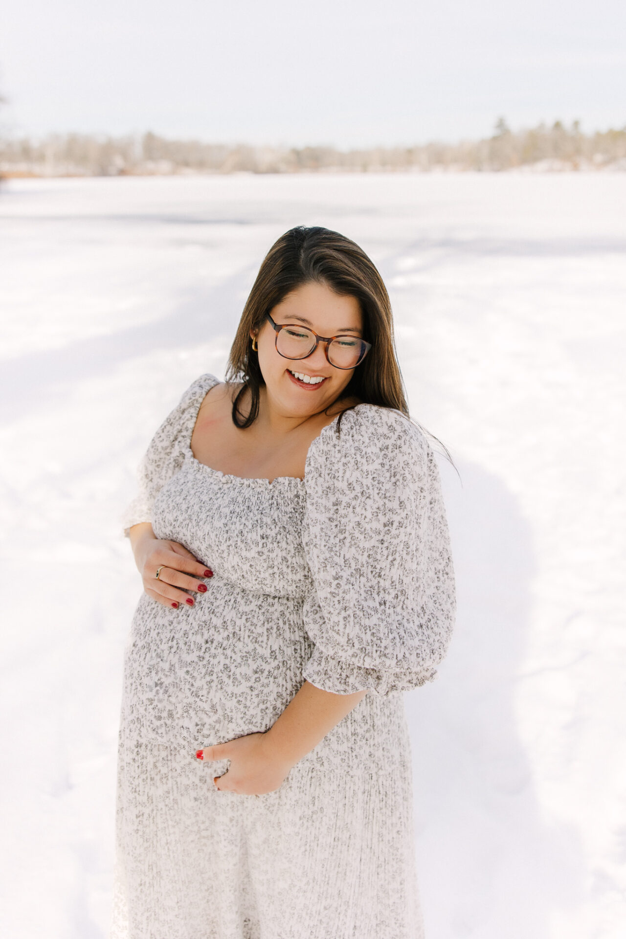 snowy winter maternity photo in Natick Massachusetts by Sara Sniderman Photography