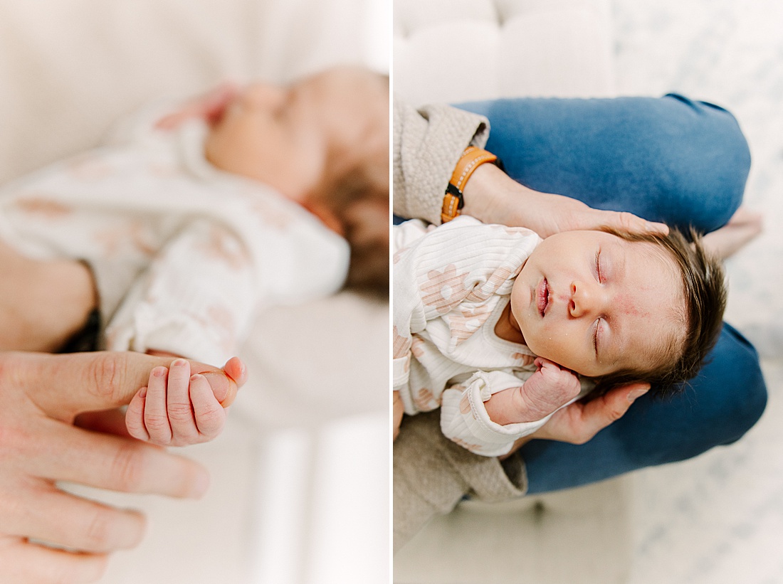 father holds newborn during in-home newborn photo session with Sara Sniderman Photography in Natick Massachusetts