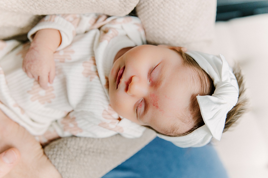 baby sleeps during in-home newborn photo session with Sara Sniderman Photography in Natick Massachusetts