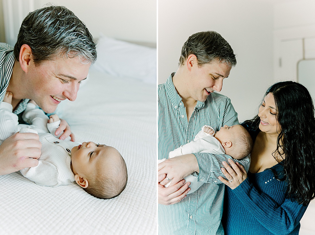 father holds baby during in-home newborn photo session with Photographer Sara Sniderman in Metro West Boston. 