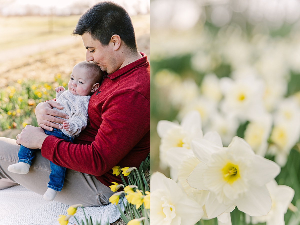dad holds baby during spring family photo session with Sara Sniderman Photography in Wellesley MA