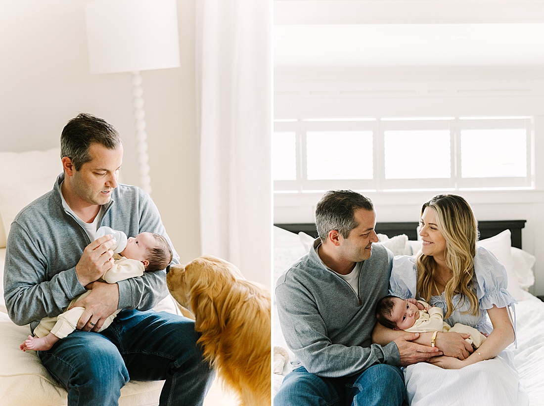 dad gives baby a bottle and dog sniffs baby during in home newborn photo session with Sara Sniderman Photography in Holliston Massachusetts